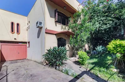Casa com 3 quartos à venda na avenida capivari, --, cristal, porto alegre por r$ 1.050.000