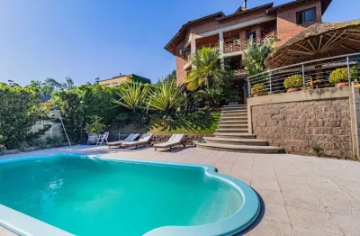 Casa em condomínio fechado com 4 quartos à venda na estrada jorge pereira nunes, --, campo novo, porto alegre por r$ 2.200.000