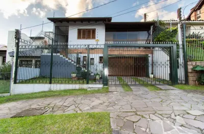 Casa com 3 quartos à venda na rua doutor egydio michaelsen, --, cavalhada, porto alegre por r$ 980.000