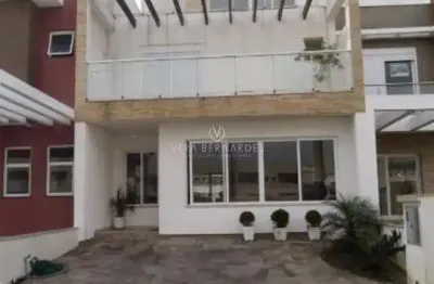 Casa em condomínio fechado com 4 quartos à venda na rua eroni soares machado, --, hípica, porto alegre por r$ 950.000