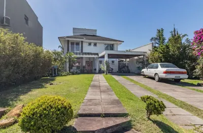 Casa em condomínio fechado com 3 quartos à venda na avenida juca batista, --, belém novo, porto alegre por r$ 2.150.000