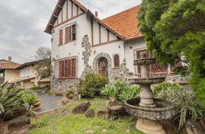 Casa com 4 quartos à venda na rua guaiana, --, vila assunção, porto alegre por r$ 1.600.000