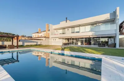 Casa em condomínio fechado com 6 quartos à venda na Avenida Juca Batista, --, Belém Novo, Porto Alegre por R$ 5.500.000