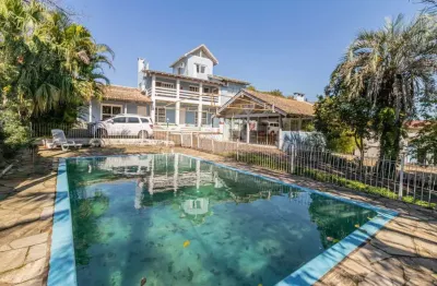 Casa com 6 quartos à venda na rua marquês do maricá, --, vila nova, porto alegre por r$ 1.300.000
