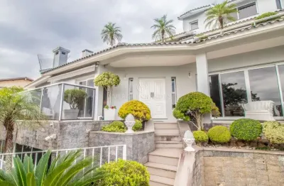Casa com 3 quartos à venda na rua alcebíades antônio dos santos, --, nonoai, porto alegre por r$ 1.790.000