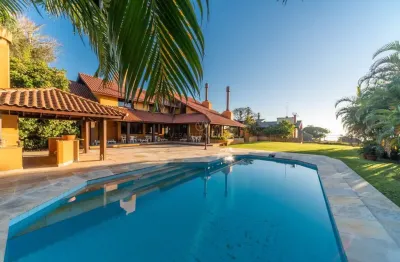 Casa com 4 quartos à venda na rua coroados, --, vila assunção, porto alegre por r$ 3.600.000