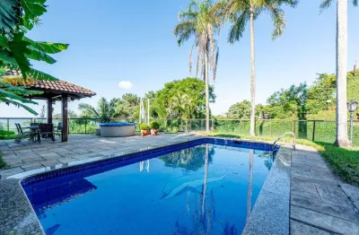 Casa com 3 quartos à venda na Avenida Guaíba, --, Vila Assunção, Porto Alegre por R$ 3.300.000