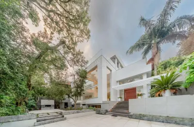 Casa com 3 quartos à venda na rua doutor possidônio cunha, --, vila assunção, porto alegre por r$ 4.500.000