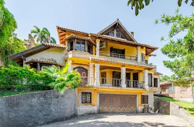 Casa com 4 quartos à venda na avenida coronel marcos, --, pedra redonda, porto alegre por r$ 2.100.000