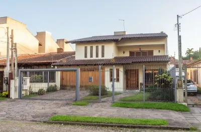 Casa com 5 quartos à venda na avenida pereira passos, --, vila assunção, porto alegre por r$ 2.320.000