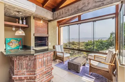 Casa em condomínio fechado com 3 quartos à venda na avenida guaíba, --, vila assunção, porto alegre por r$ 1.050.000