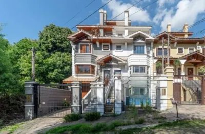 Casa com 4 quartos à venda na rua almirante mariath, --, tristeza, porto alegre por r$ 990.000