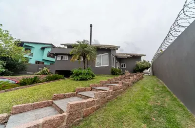 Casa com 4 quartos à venda na rua amapá, --, vila nova, porto alegre por r$ 1.650.000