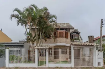 Casa com 4 quartos à venda na avenida guarujá, --, guarujá, porto alegre por r$ 850.000