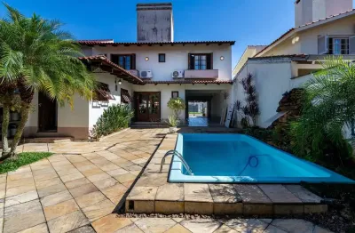 Casa com 3 quartos à venda na rua adão pinheiro da silva, --, ipanema, porto alegre por r$ 1.272.000