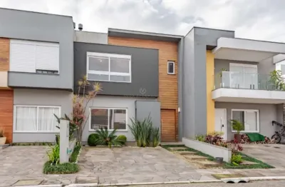 Casa em condomínio fechado com 3 quartos à venda na rua eroni soares machado, --, hípica, porto alegre por r$ 820.000