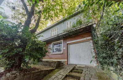 Casa com 4 quartos à venda na rua guaraum, --, vila assunção, porto alegre por r$ 1.065.000