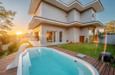 Casa em condomínio fechado com 3 quartos à venda na estrada das três meninas, --, vila nova, porto alegre por r$ 1.795.000