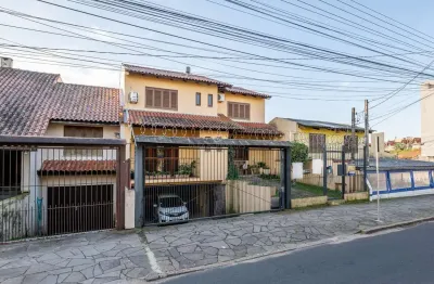 Casa com 3 quartos à venda na rua doutor mário totta, --, tristeza, porto alegre por r$ 870.000
