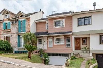 Casa em condomínio fechado com 3 quartos à venda na rua adriano pereira da silva, --, vila nova, porto alegre por r$ 1.090.000