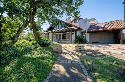 Casa em condomínio fechado com 3 quartos à venda na avenida juca batista, --, belém novo, porto alegre por r$ 2.400.000