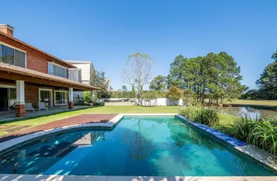 Casa em condomínio fechado com 4 quartos à venda na avenida juca batista, --, belém novo, porto alegre por r$ 4.500.000