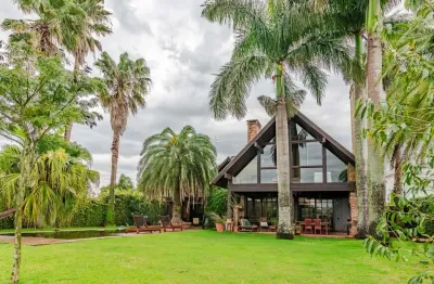 Casa em condomínio fechado com 5 quartos à venda na avenida juca batista, --, belém novo, porto alegre por r$ 1.980.000