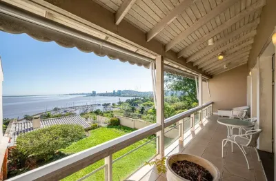 Casa com 4 quartos à venda na rua bororó, --, vila assunção, porto alegre por r$ 2.490.000