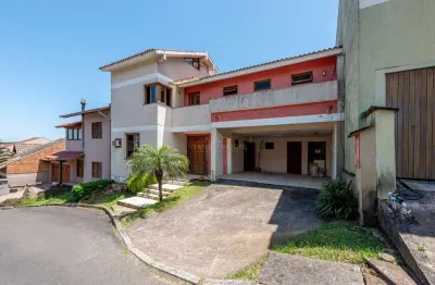 Casa em condomínio fechado com 4 quartos à venda na avenida vicente monteggia, --, cavalhada, porto alegre por r$ 790.000