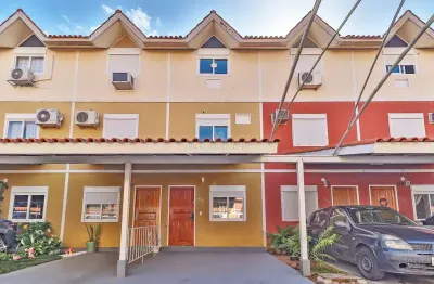 Casa em condomínio fechado com 3 quartos à venda na Rua Afonso Arinos, --, Camaquã, Porto Alegre por R$ 450.000