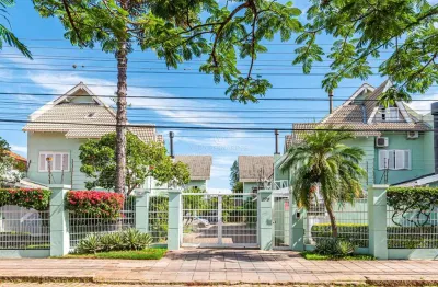 Casa em condomínio fechado com 4 quartos à venda na Rua Jacipuia, --, Guarujá, Porto Alegre por R$ 647.000