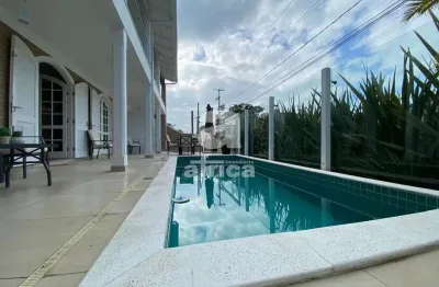 Guaratuba, residência com piscina aquecida, 4 quartos sendo 2 suítes, 4 vagas de garagem, próxima da praia central, guaratuba/pr - imobiliária áfrica, brejatuba, guaratuba - pr