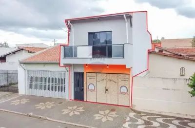Sobrado com 2 dormitórios, salão comercial e edícula na av. emílio pacagnella, pq. das árvores.