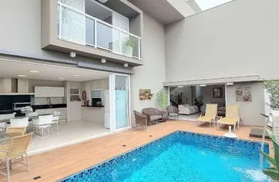 Casa de condomínio para aluguel e venda com 430 metros quadrados com 4 quartos