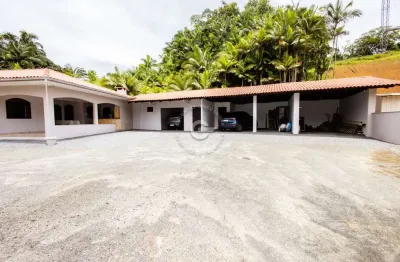 Casa com 4 quartos à venda na artur sardagna, 79, caixa d'água, guaramirim, 313 m2 por r$ 1.490.000