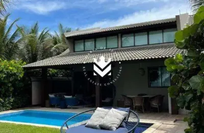 Imagine viver em um paraíso à beira da praia, desfrutando de uma casa confortável e confortável.