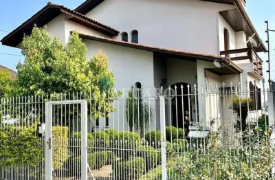 Casa com 4 quartos à venda na rua pioneiro joão polla, 515, rio branco, caxias do sul, 403 m2 por r$ 1.050.000