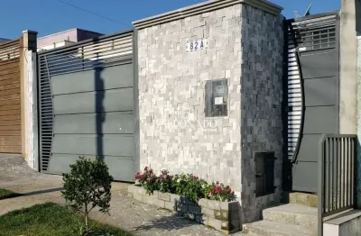 Casa em extrema mg com 2 dormitórios sendo 1 suíte 2 vagas de garagem