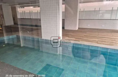 Apartamento com 2 dormitórios à venda, 60 m² por r$ 429.000 - caiçara - praia grande/sp