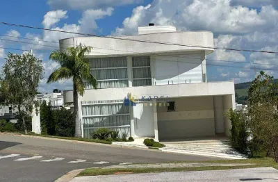 Sobrado á venda com 4 suítes, piscina com borda infinita, vista permanente, sem vizinhos de fundos no condomínio tipo clube vale das águas!!