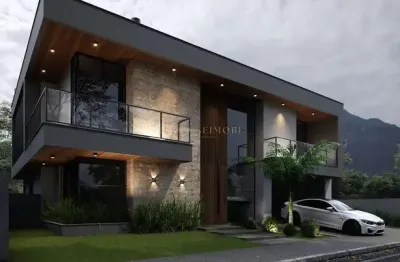 Casa em condomínio fechado com 3 quartos à venda na rua lagoinha, 1, pedra branca, palhoça por r$ 3.684.000