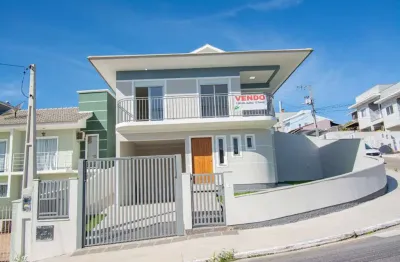 Casa com 3 quartos à venda na avenida josé francisco coelho, 36, forquilhas, são josé por r$ 699.000