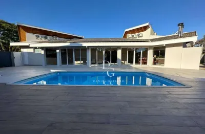 Casa com 5 dormitórios à venda, 430 m² por r$ 4.950.000,00 - condomínio vale do sol - tremembé/sp