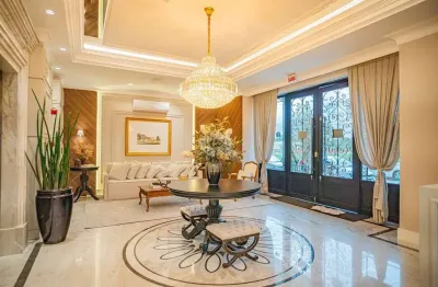 Apartamento de altíssimo padrão com 4 suítes na meia praia em itapema