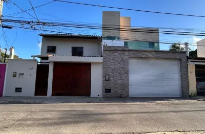 Predio residencial com linda casa com quintal, garagem e bem pertinho do mar