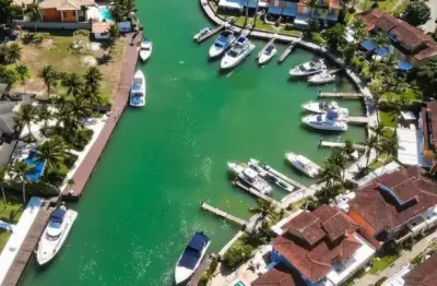 Linda casa debruçada na areia no condomínio porto galo angra