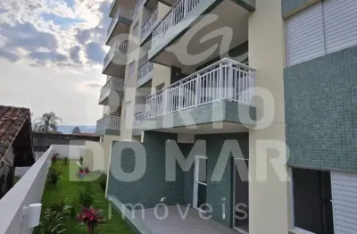 Apartamento térreo com quintal privativo a apenas 200 metros da praia no bairro vista linda – bertioga/sp