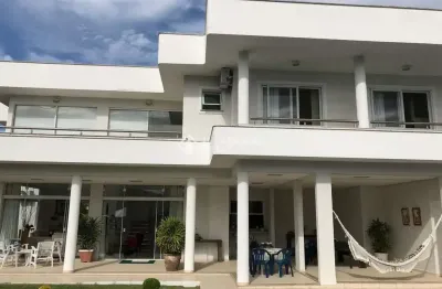 Casa com 6 quartos à venda na rua dos camuris, 114, jurerê internacional, florianópolis, 420 m2 por r$ 7.500.000