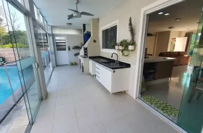 Casa em condomínio fechado com 4 quartos à venda na avenida luiz boiteux piazza, 4256, cachoeira do bom jesus, florianópolis, 224 m2 por r$ 2.240.000
