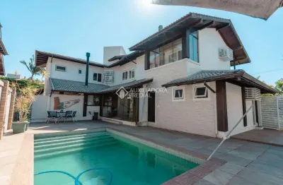 Casa com 4 quartos à venda na rua dos tucunarés, 30, jurerê internacional, florianópolis, 520 m2 por r$ 6.400.000